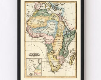 May include: Framed vintage map of Africa, featuring a detailed depiction of the continent with various regions labeled. The map is in a black frame, with a cream-colored background. The word "AFRICA" is printed at the bottom.