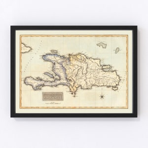 May include: An antique map of Haiti and Saint Domingo, showing the island's geography and rivers. The map is printed on aged paper with a light brown background and features a compass rose in the lower right corner.
