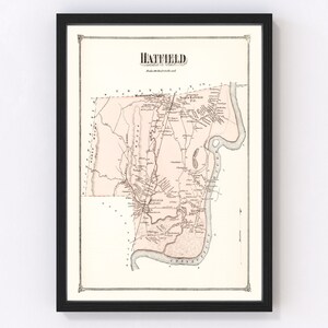 May include: An antique map of Hatfield, Massachusetts, printed in black and brown ink on cream paper. The map shows the town's streets, buildings, and waterways. The title "Hatfield" is printed at the top of the map.