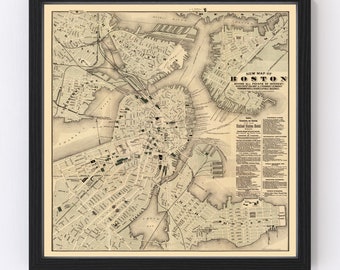 May include: An antique map of Boston, Massachusetts, printed in black and white with a beige background. The map shows the city's streets, waterways, and landmarks. The text "NEW MAP OF BOSTON" is printed at the top of the map. The map is framed in a black frame.