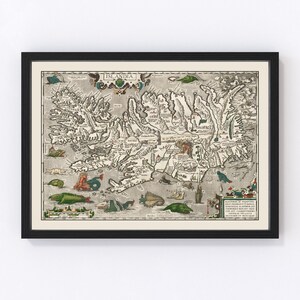 May include: An antique map of Iceland, "Islandia", with a detailed illustration of the island's geography and coastline. The map is surrounded by a black frame and features a decorative border with a title cartouche.