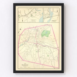May include: Vintage map of Danbury, Connecticut, showing the city's wards and streets. The map is printed in black, brown, green, and pink on a cream-colored background. The map is framed in black.