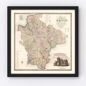 May include: Framed vintage map of Devon, England, in a black frame. The map features detailed cartography with various colors and text, including the title "Map of the County of Devon." A church illustration is at the bottom right.