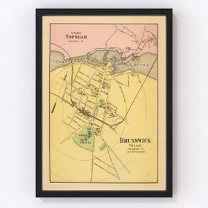 May include: An antique map of the villages of Topsham and Brunswick, Maine. The map is printed on yellow paper with green and pink accents. The map shows the streets, buildings, and waterways of the two villages. The text on the map reads "Village of Topsham, Sagadahoc Co." and "Village of Brunswick, Cumberland Co. Scale 100 ft. to an inch."