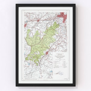 May include: Vintage map of the Pisgah National Forest in North Carolina. The map shows roads, rivers, and other geographical features. The map is printed in black, red, and green on a white background. The map is titled "Pisgah National Forest, North Carolina, 1938."