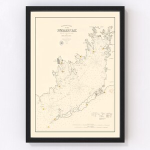 May include: A vintage nautical chart of Buzzards Bay, Massachusetts, printed in black and white on a cream-colored background. The chart includes detailed navigational information, including depths, shoals, and lighthouses. The title "BUZZARDS BAY" is printed in black at the top of the chart.