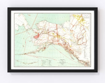 May include: A vintage map of Alaska from 1917, showing the state's geography, including mountains, rivers, and coastlines. The map is printed in black, red, and yellow on a white background. The map is framed in black.