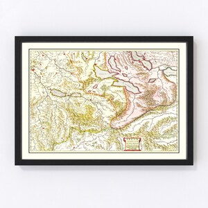 May include: An antique map of the Argow region of Switzerland, printed in the 1700s. The map is in shades of green, brown, and red, with a title in a red box at the bottom right corner. The map shows the borders of the region, rivers, and towns.