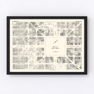 May include: A black and white map of Madison, Wisconsin, showing the city's street grid. The map is framed in a black frame and includes the text "Wisconsin State Capitol" in the center.