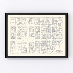 May include: A vintage map of New Castle, Pennsylvania, showing the street layout and building locations. The map is printed in blue ink on a white background and framed in black.