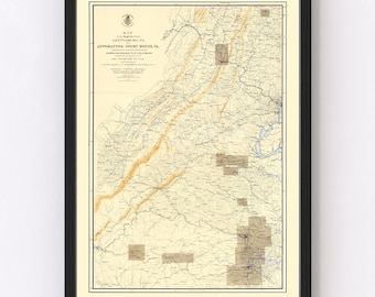 May include: A vintage map of the battlefields of Gettysburg, Pennsylvania and Appomattox Court House, Virginia. The map is printed on cream-colored paper with brown and orange lines and text. The map is framed in a black frame.