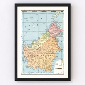 May include: A vintage map of Borneo, showing the island's political divisions in the early 20th century. The map is color-coded to show the different territories, including British North Borneo, Sarawak, and Dutch Borneo. The map also includes the names of major cities and rivers.