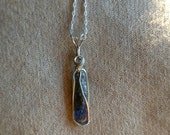 7.9 carat Natural Tanzanite Crystal Wire Wrapped Sterling Silver Pendant