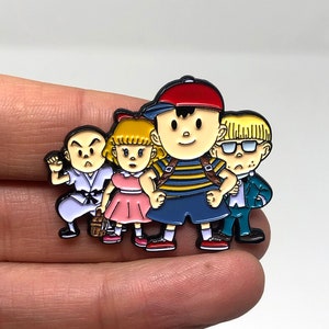 EarthBound for SNES - Ness, Paula, Jeff and Poo enamel pin or magnet - Classic SNES retro gaming art
