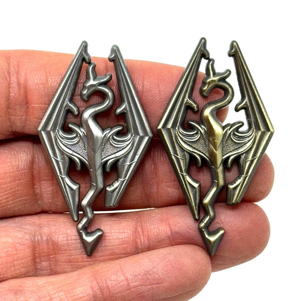 The Elder Scrolls V Skyrim, the Seal of Akatosh box art emblem 2” enamel pin and magnet, available in silver and bronze  - Retro gaming pin