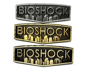 BioShock, logo emblem 2” enamel pin and magnet, available in antique bronze, ant gold and ant silver - classic fps game art