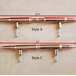 May include: Two styles of copper-colored bullet-shaped cabinet door pulls. Style A is 12.5 inches long and Style C is 11 inches long.