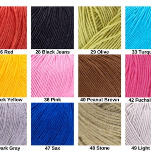 May include: A grid of twelve yarn skeins in various colors, each labeled with a number and name: 26 Red, 28 Black Jeans, 29 Olive, 33 Turquoise, 35 Dark Yellow, 36 Pink, 40 Peanut Brown, 42 Fuchsia Pink, 46 Dark Gray, 47 Sax, 48 Stone, and 49 Light Gray.