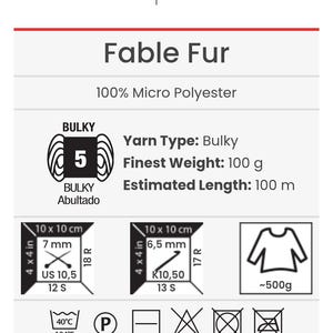 May include: Product attributes chart for Fable Fur 100% micro polyester yarn. Features include bulky weight category 5, 100g weight, 100m length, knitting needle size US 10.5, crochet hook size K10.5, gauge information, and care instructions including 104&deg;F wash.