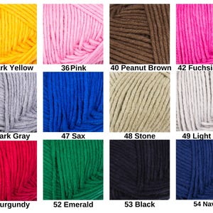 May include: A collection of yarn skeins in various colors, including dark yellow, pink, peanut brown, fuchsia pink, dark gray, sax, stone, light gray, burgundy, emerald, black, and navy. Each skein is labeled with a number and color name.