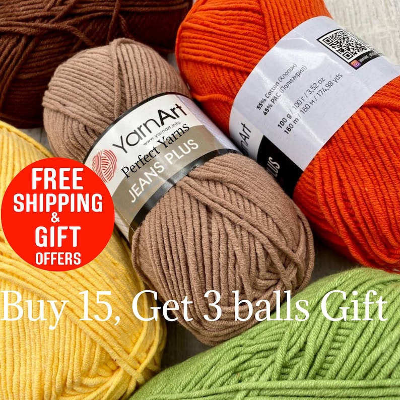 May include: A collection of YarnArt Perfect Jeans Plus yarn balls in various colors, including brown, orange, yellow, and green. The image features a label with the brand name and yarn details. The text "Buy 15, Get 3 balls Gift" is also visible.