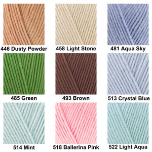 May include: A grid of nine yarn color samples featuring textured strands. Colors include 446 Dusty Powder, 458 Light Stone, 481 Aqua Sky, 485 Green, 493 Brown, 513 Crystal Blue, 514 Mint, 518 Ballerina Pink, and 522 Light Aqua with labels.