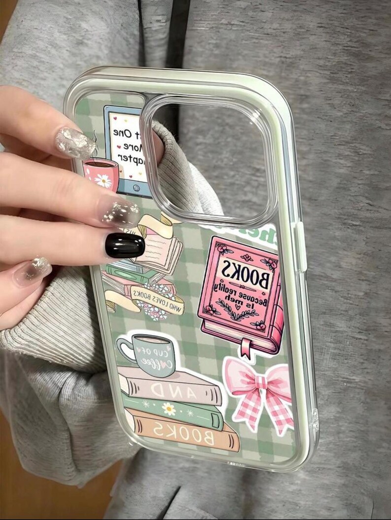 May include: Clear phone case with a green and white checkered pattern. The case features book and coffee cup graphics, along with the text "BOOK2" and "COB OF". A pink bow and a stack of books are also visible.