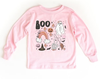May include: Pink long-sleeved shirt with a graphic print of a ghost, rainbow, witch hat, pumpkins, bats, and the word "BOO".