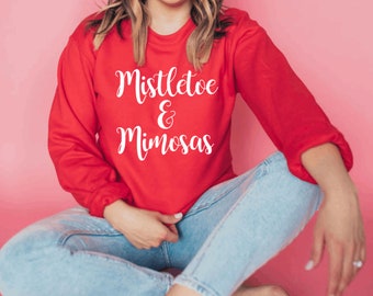 mistletoe and mimosas sweatshirt