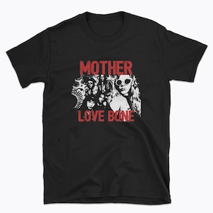 May include: Black t-shirt with a white graphic of a band called "Mother Love Bone". The graphic features a group of people with a grunge aesthetic.