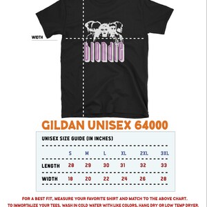May include: Black Gildan Unisex 64000 t-shirt size chart with measurements in inches. The chart shows the length and width of the shirt in sizes S, M, L, XL, 2XL, and 3XL. The text "Gildan Unisex 64000" is in a white font on a black background. The text "Unisex Size Guide (In Inches)" is in a white font on a black background. The text "Length" and "Width" are in a white font on a black background. The text "S, M, L, XL, 2XL, 3XL" is in a white font on a black background. The text "28, 29, 30, 31, 32, 33" is in a white font on a black background. The text "18, 20, 22, 24, 26, 28" is in a white font on a black background.