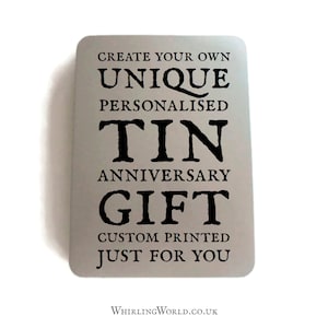 May include: A silver tin with black text that reads "Create your own unique personalised tin anniversary gift custom printed just for you" and "WhirlingWorld.co.uk" at the bottom.