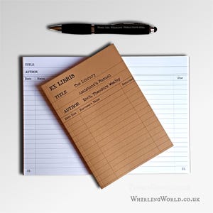 May include: A black pen with the text "Make the Whirling World Stand Still" lies above a tan library card and a white book checkout sheet. The library card has the words "Ex Libris" and "The Library" printed on it. The website address is visible.