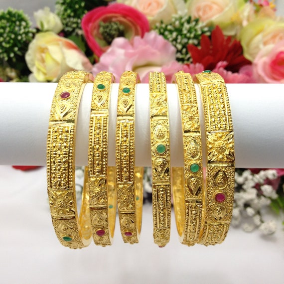 Gold bangles pakistani best sale design