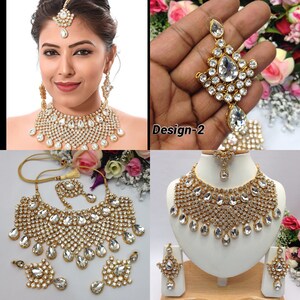 May include: A gold and white bridal jewellery set with a necklace, earrings, and a tikka. The set is adorned with sparkling white stones.