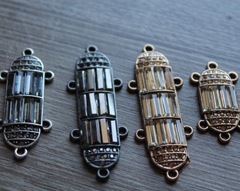 Vintage Art Déco Plata, oro, conectores de metal, 6 bucles, pedrería de vidrio facetado Baguette, ámbar, negro, gris.