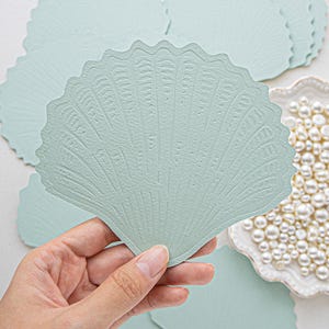 Luxuriöse Muschel Küstenhochzeitseinladung, blindgepresste Hochzeit am Meer lädt ein, benutzerdefinierte Muschelform beizufügen