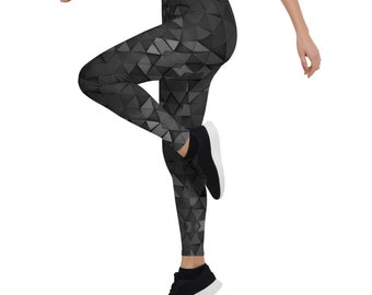 May include: Black leggings with a geometric pattern of triangles. The leggings are made of a stretchy, comfortable fabric and are perfect for working out or running errands.