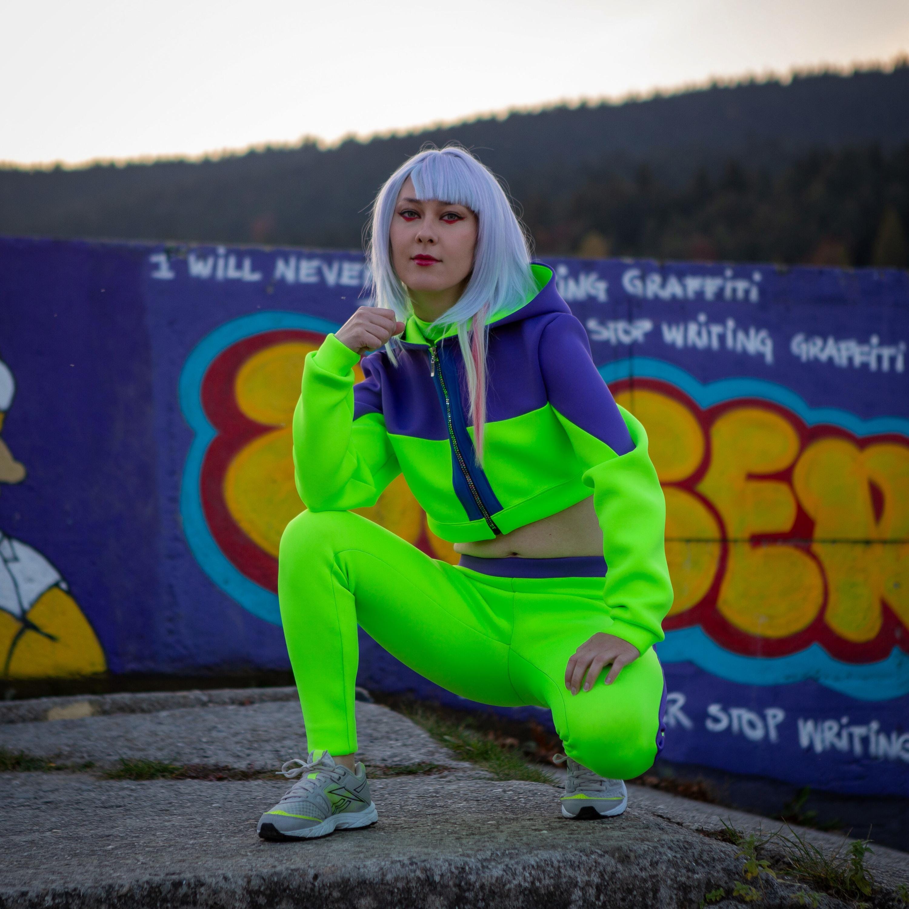 Lucy Cyberpunk Hacker Cosplay Tracksuit – Neon Green & Purple Two Lucy Cyberpunk Hacker Cosplay Tracksuit – Neon Green & Purple Two