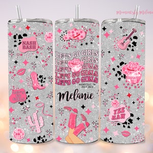 May include: Three silver glitter tumblers with pink and black designs. The tumblers feature a variety of designs including stars, cowboy hats, lips, boots, and the text "Let's Go Girls", "Nash Bash", "Howdy", and "Yee Haw".