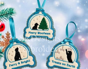 May include: Three dog-themed Christmas ornaments with teal ribbon hangers. Each ornament features a black dog silhouette inside a snow globe design with text: "Merry Woofmas", "Furry & Bright", and "Treats on Earth". The ornaments have a cream background and teal trim.