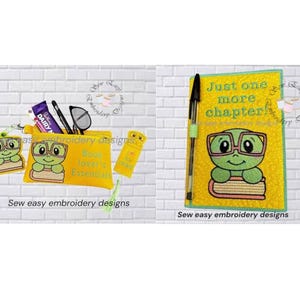 May include: A yellow zippered pouch and a yellow fabric book cover featuring an embroidered green turtle wearing glasses and reading a book. The book cover has the text Just one more chapter embroidered in green. A black pen is clipped to the cover.