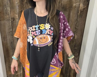 Its Game Day t shirt revamped into a colorful poncho using kantha material.