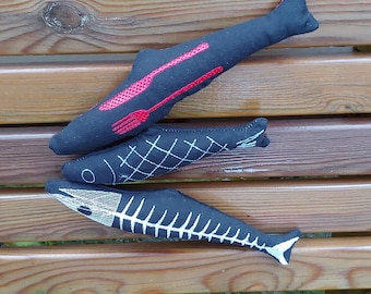 Fish embroidered organic kicker catnip toys for your cat for hours of fun. Set of 3 long fish handmade.  Black cotton fabric lightly stuffed