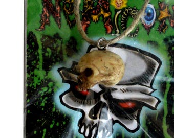 Skinless Jim's skeliton heads - necklace