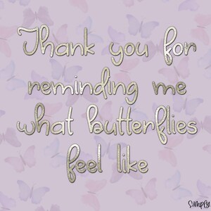 May include: A light purple background with a silver glitter font that reads "Thank you for reminding me what butterflies feel like". The background is covered with a pattern of watercolor butterflies in shades of purple and blue.