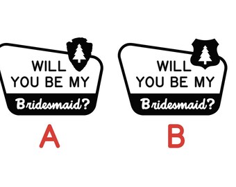 May include: Two black and white signs with the text "Will you be my bridesmaid?" and a pine tree icon. The signs are labeled "A" and "B".
