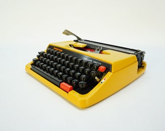 Máquina de escribir vintage Prestige 250 TR: máquina de escribir manual portátil amarilla con estuche