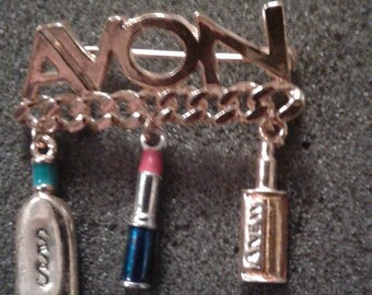 Avon's gold pin. Rep award.