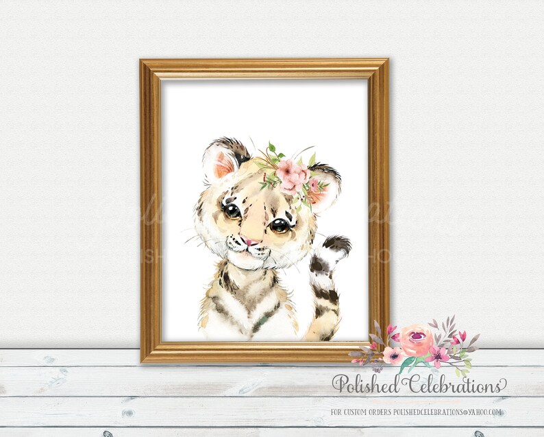 May include: A watercolor painting of a cute tiger cub wearing a pink flower crown. The tiger has brown and black stripes and big brown eyes. The background is white.